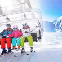 Healthy skiers on ski lift enjoying themselves