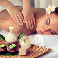 Woman having massage in the spa salon