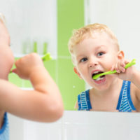 toddler brushing teeth