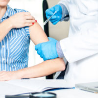 person getting flu shot