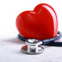toy heart wrapped in stethoscope picture