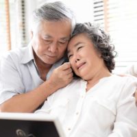older couple in tears