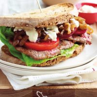 Steak sandwich with caramelised onions and mustard cream