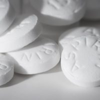 Macro shot of white asiprin on white background