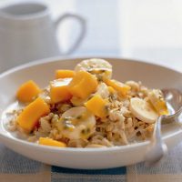 Bircher muesli with tropical mangos bannana and passionfruit