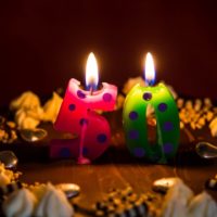 Closeup of candles on 50th birthday cake