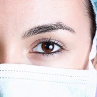 Portrait of a young female doctor close up of eyes