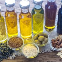 Bottles containing different varieties of cooking oil