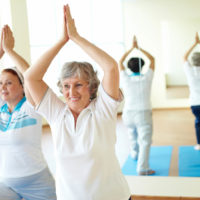 seniors doing yoga