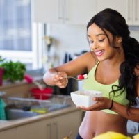 Woman healthy eating strawberry