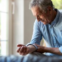 An old man having rheumatoid athritis