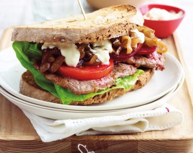 Steak sandwich with caramelised onions and mustard cream